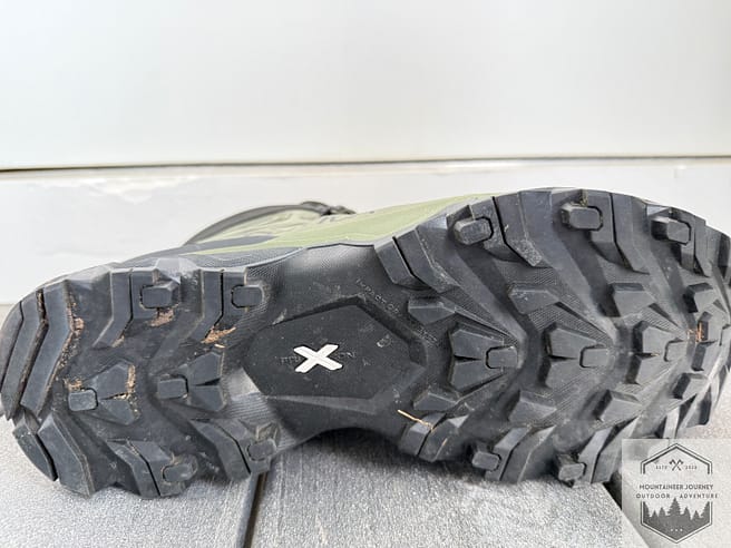 View of outsole, extra heel lugs in back for braking