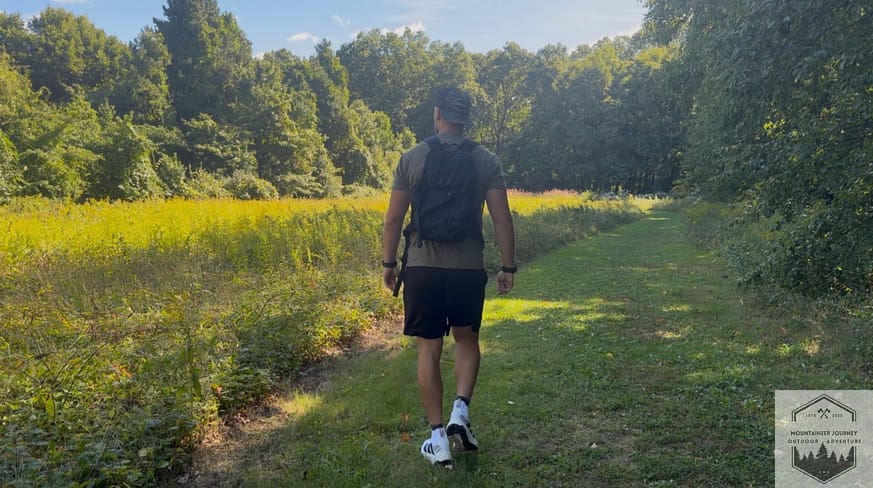 Walking on connecting grass trail route during testing