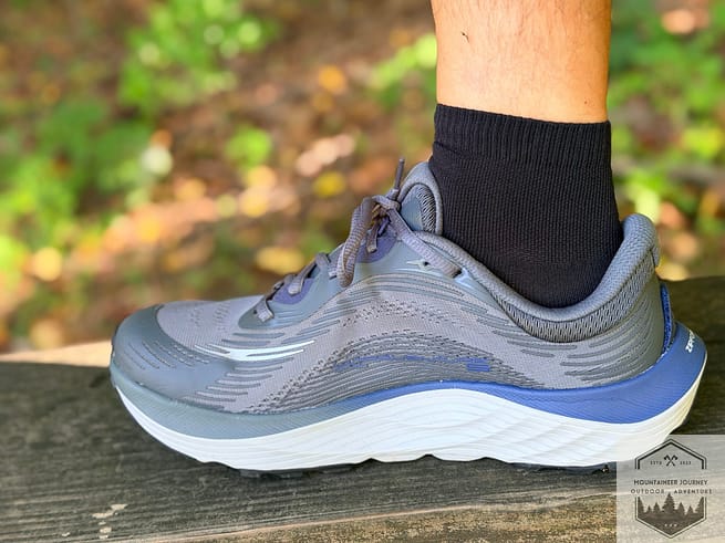 View of the Topo Ultraventure 5 on a bench.