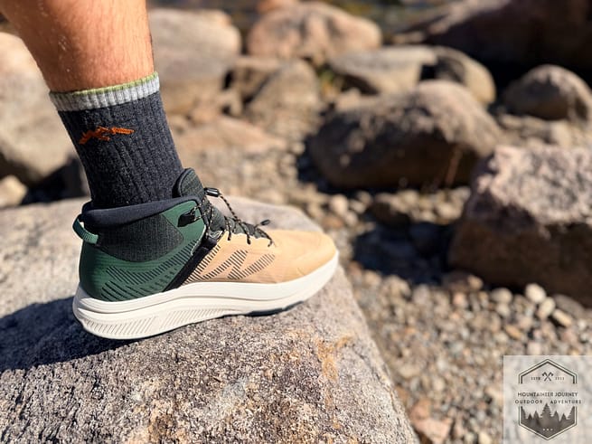 Sitting on rocky boulder fields with Teva Hurrican Trailsetter Hiking Boots