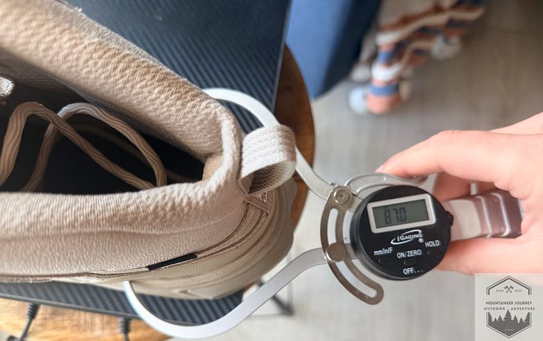 Heel width measured at 87mm on the Hoka Kaha 3 with our digital caliper.