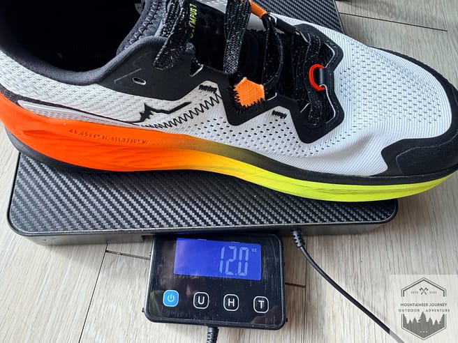 Altra olympus 7 weighing in at 12 ounces per shoe on our calibrated scale