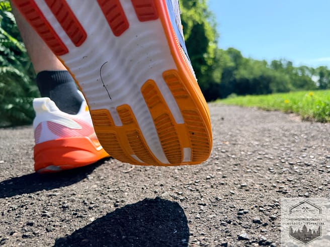 View of outsole gripping on asphalt during testing