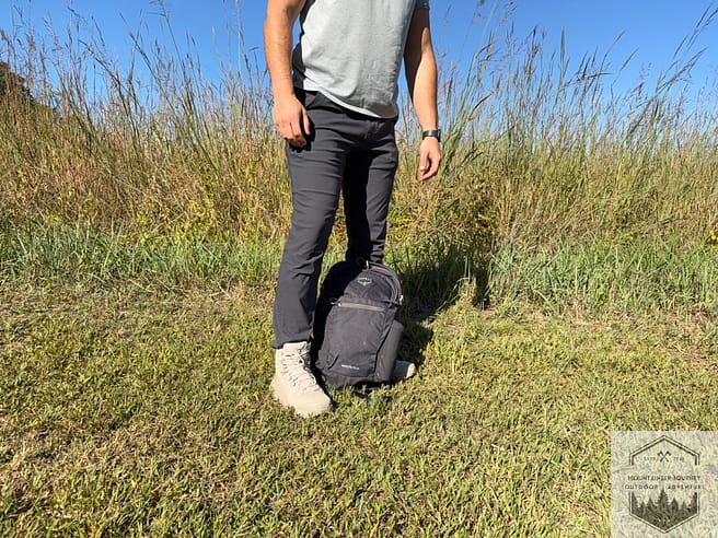 Standing next to Osprey Daylite on grass to show size