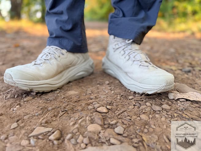 View of the Hoka Kaha 3 on dirt trail with laces nice and tight, showing excellent ankle lockdown and support.