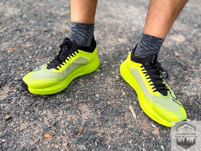 Front view of our Arc'teryx Sylan 2s on gravel to show the narrowness of the midfoot