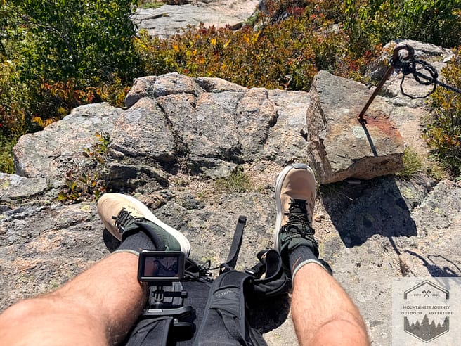 Sitting on top of summit with Hurrcaine Trailsetter Mids on after testing