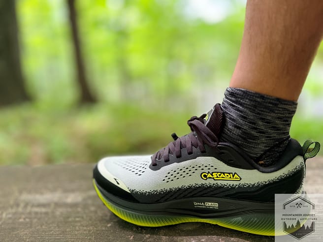 View of the cascadia 20 resting on a bench during our testing, there is no over compression of the outsole when putting weight on a static surface.
