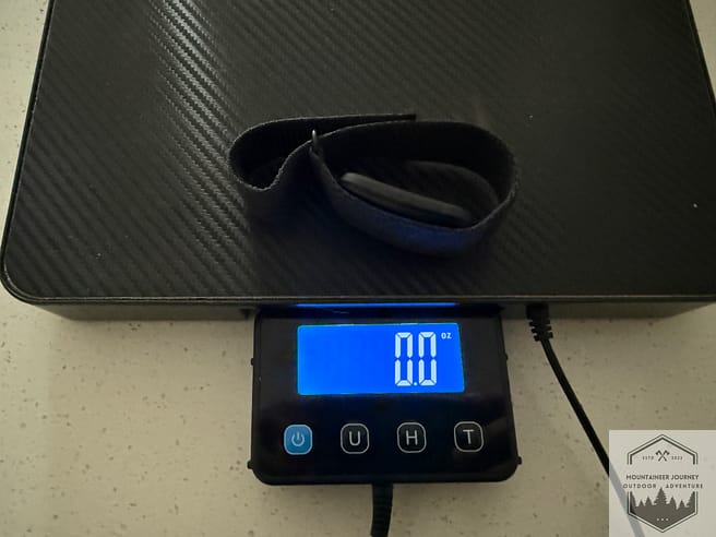 Garmin Cirqa weighing 0 oz on our scale, meaning it weighs less than 28 g total as it's not picked up on the scale