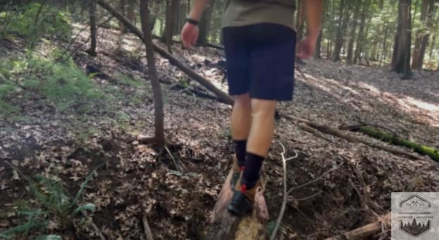 Balancing on a log while testing out the grip of the Quest 4