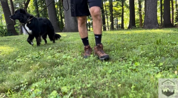 blog-img-1726409488672 wearing moab 3 while hiking with a dog