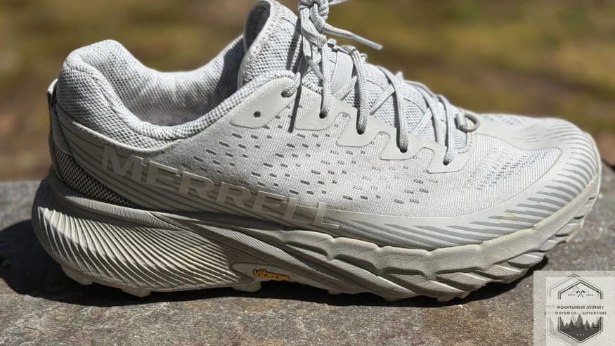 Lateral view of the Merrell Agility Peak 5 showing the breathable engineered mesh upper and the high-traction Vibram Megagrip outsole.