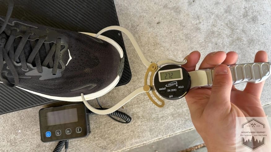 Measuring the toe box of the Clifton 10 at 2.72 inches with caliper