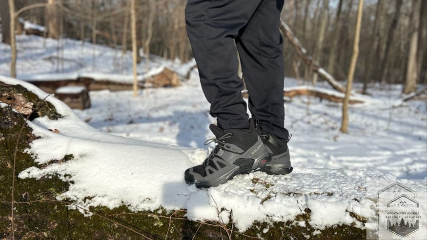 Standing on a log after testing out the Salomon X-Ultra 4.