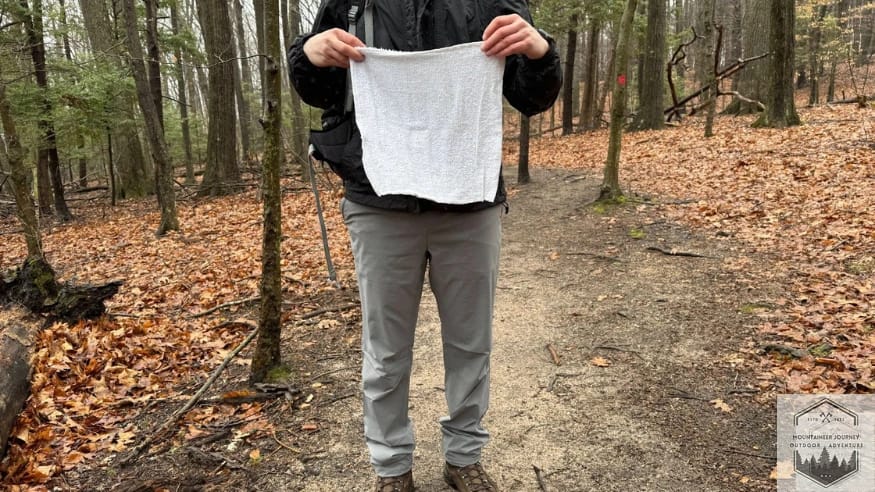Showing the towel from my backpack while hiking on the trail
