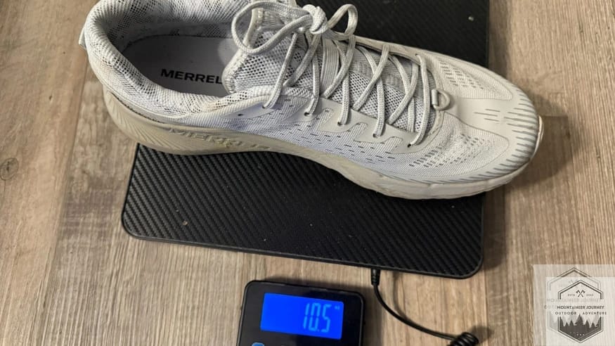Weighing the Merrell Agility Peak 5 on a digital scale at 10.5 oz to verify the manufacturer's weight specs during our unbiased review.