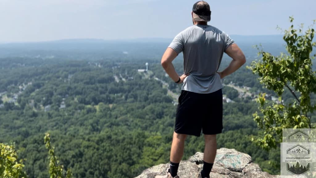 Our Author(Tyler) at the top of the mountain summit after testing hiking boots