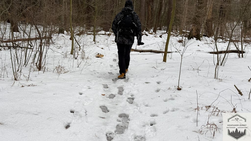Hiking in the snow with hiking boots