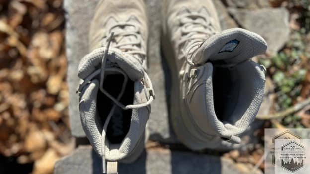 blog-img-1736370729885 Over the top heel view of Hoka Kaha 3 hiking boots showing stable platform.