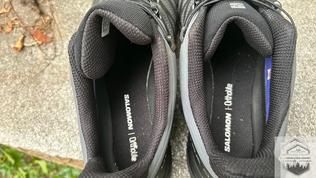 Inspecting the hiking boot midsole during testing for our most comfortable hiking boots of 2026 guide.