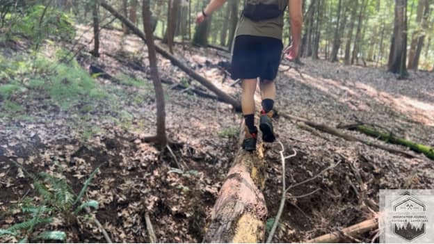 blog-img-1735827183509 testing the stability of the salomon quest hiking boots across a wet log