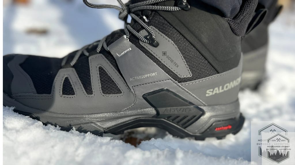 Salomon X Ultra 4 Mid in the snow