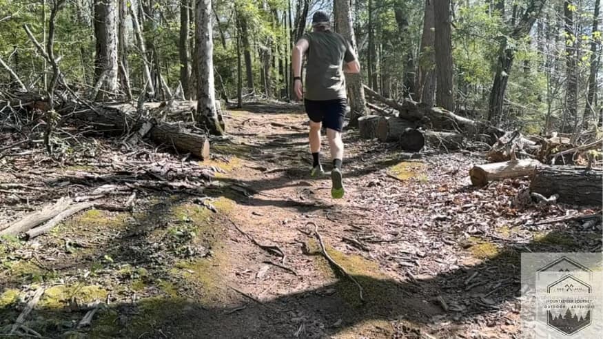 running uphill in the salomon trail running shoes as part of our objective testing standards