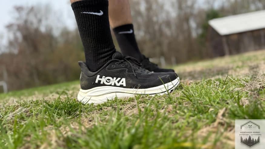 Hoka Clifton 10 on foot demonstrating increased stack height and thick midsole cushioning compared to Hoka Clifton 9
