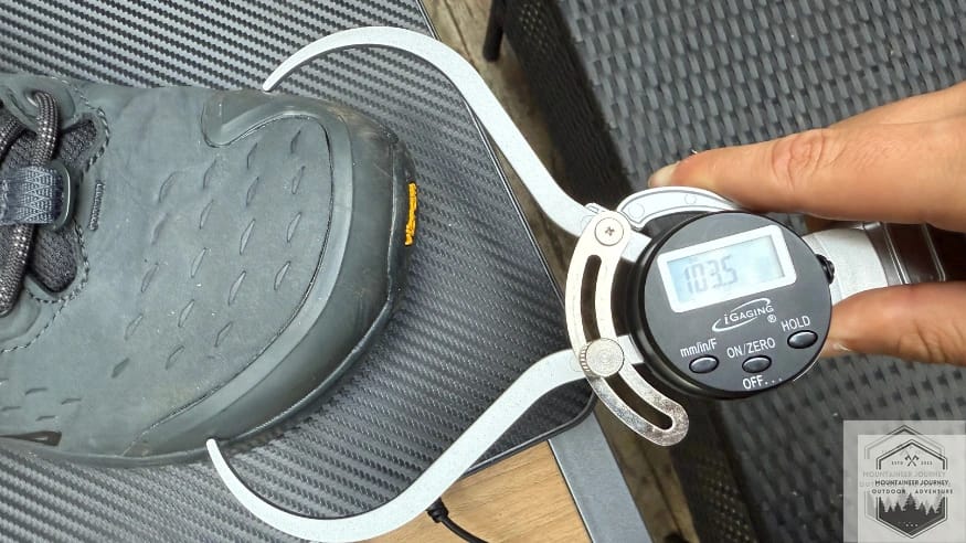 Measuring the Altra Olympus 6 "Original" FootShape toe box with a caliper at 103.5 mm to verify maximum toe splay room.