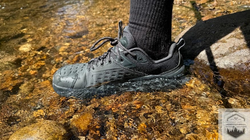 Testing the waterproofness of the Altra Olympus 6 in the water during our 10 minute submersion testing