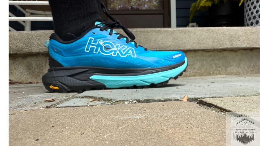 Close-up side profile of the Hoka Mafate 5 showing the texture of the woven textile mesh.