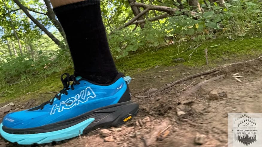 Hoka Mafate 5 heel compression on rock showing instability issues on technical terrain.