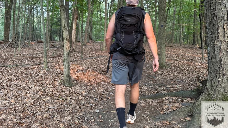 Wearing lighter synthetic socks during warmer weather hiking.