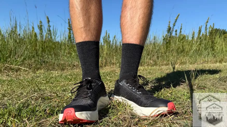 Wearing the Kjerag 2 on the trail after testing, sky in background