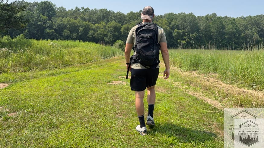Wearing Darn Tough Full Cushion hiking socks on trail during performance testing.