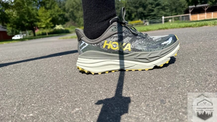 Stability testing of the Hoka Stinson 7 on an asphalt path, evaluating the H-Frame technology and road-to-trail transition.