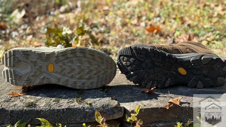 The Hoka Kaha 3 (Vibram Megagrip outsole) next to the Moab 3 (Vibram TC5+ Outsole)