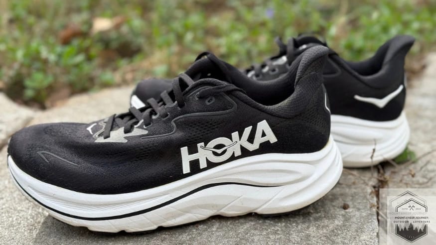 View of the Hoka Clifton 10 sitting on a concrete wall.