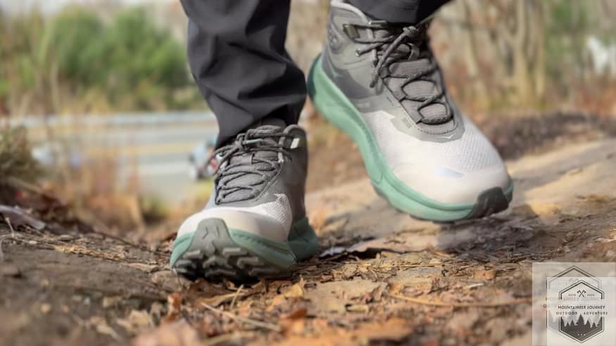 Hiking uphill covered with leaves with the Hoka Transport GTX.