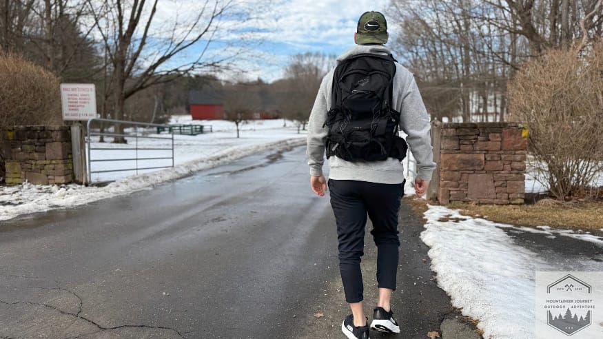 Walking on asphalt with the Hoka Gaviota 6 during testing