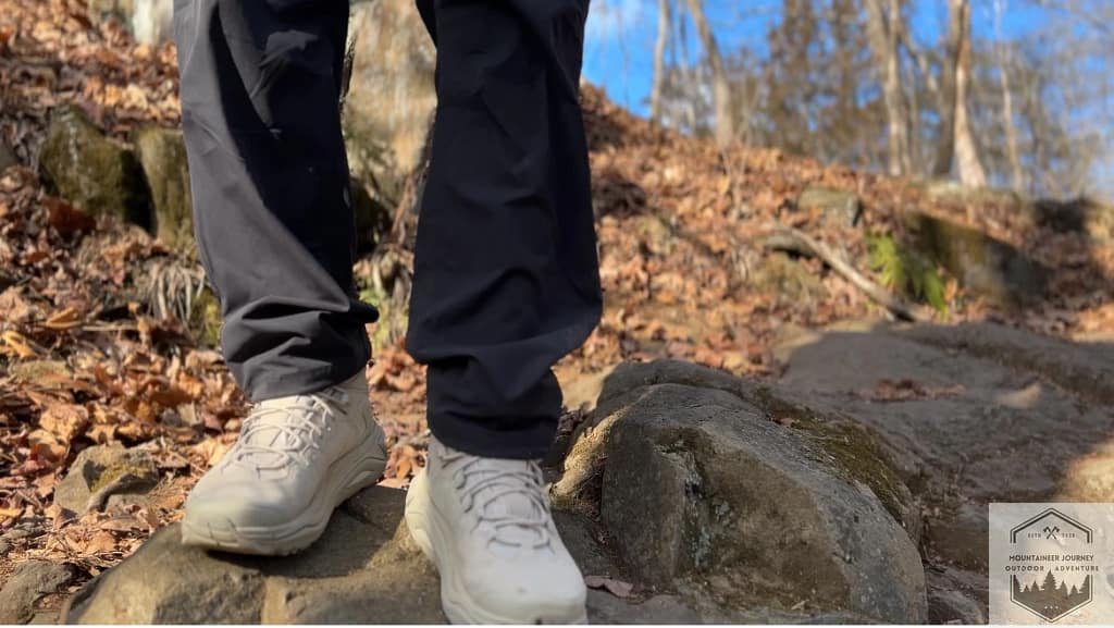The Hoka Kaha 3 has superior stability and support while on trail. standing on uneven rocks
