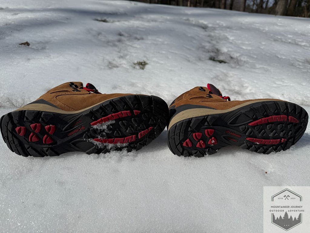 Bottom view of the Columbia Newton Ridge Plus II outsole, highlighting the omni-grip technology