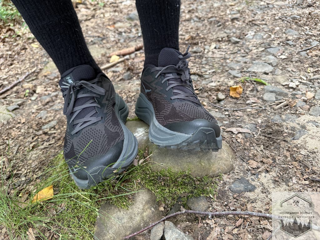 Close-up of the Hoka Challenger 8's new 3D-printed toe cap, showcasing the reinforced protection zone designed to shield against trail debris while maintaining a lightweight feel.