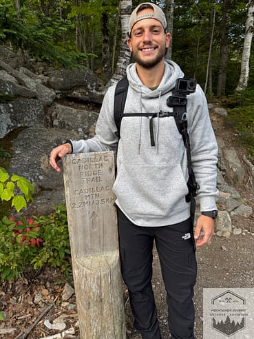 Standing at Trailhead sign of Cadilliac Mountain North Trail