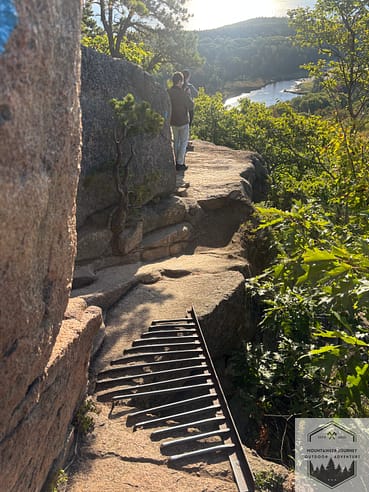 iron bridge section on beehive trail tight cliffside view