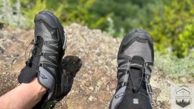 Wearing Hiking Boots At Top Of Mountain