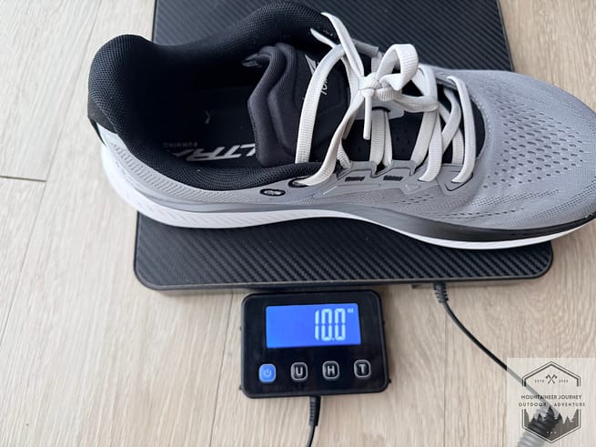 Altra Torin 9 weighing 10 oz per shoe on our scale