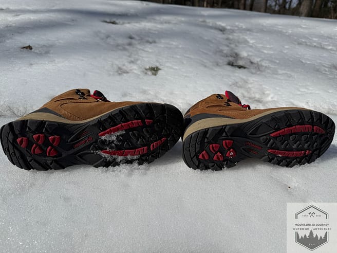 Bottom view of the Columbia Newton Ridge Plus II outsole, highlighting the omni-grip technology