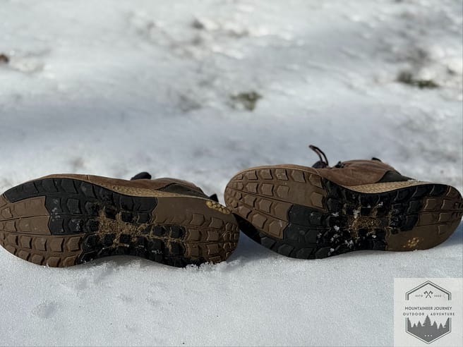 View of the Columbia Newton Ridge Plus II outsole after 5 years of use, showing wear and breakdown of the lugs, as well as flattening of the outsole
