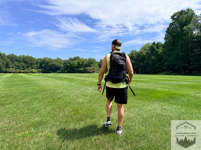 Walking in grass fields with the Hoka Transport 2